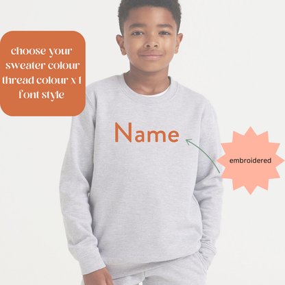 Design your own kids sweater. choose your sweater colour, font and single thread colour